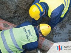 MPEC Nowy Sącz pracownicy w kasjach i kamizelkach ochronnych
